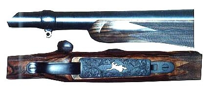 375 H & H forearm of rifle with gold lion engraved floor plate