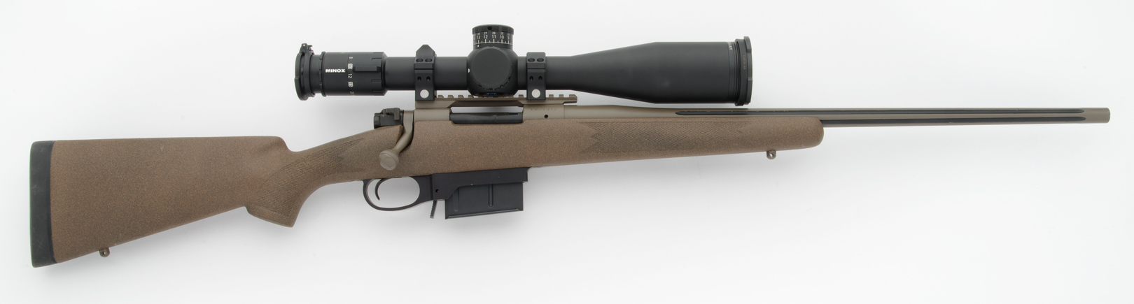Ember with optional control feed action and match grade fluted steel barrel Ember with optional control feed action and match grade fluted steel barrel