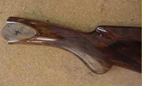 Beretta shotgun being converted from pistol grip to prince of wales