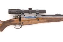  416 Rigby custom rifle with color case shroud and checkered bolt handle