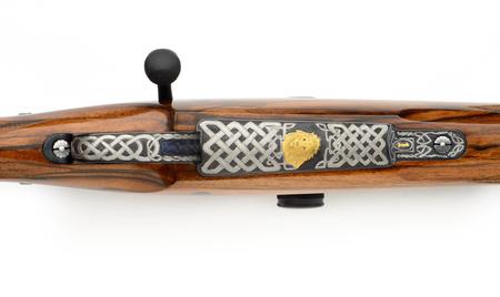  375 Todd Ramirez rifle with celtic engraving and gold lion