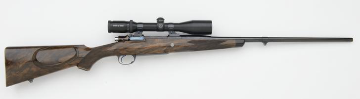 left handed 280 custom rifle with turkish walnut right side