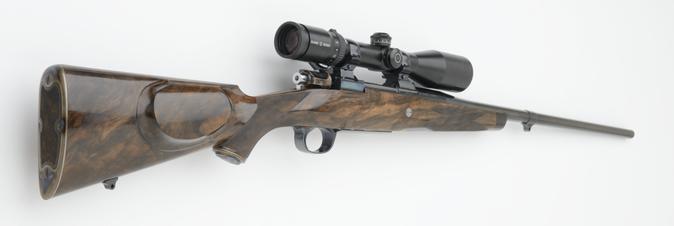  280 left handed custom rifle with Schmidt & Bender scope